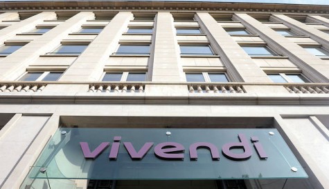 Vivendi keeps its cool as police raid Paris offices